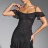 Vestito corto con spalle scoperte e decorazioni Beaufort in nero Vestito corto con spalle scoperte e decorazioni Beaufort in nero