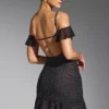 Vestito corto con spalle scoperte e decorazioni Beaufort in nero Vestito corto con spalle scoperte e decorazioni Beaufort in nero