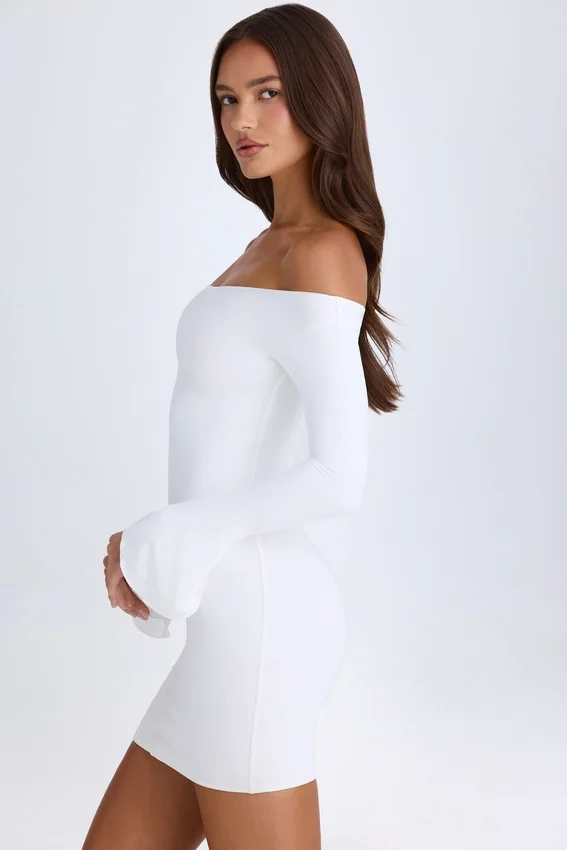 Vestito corto con spalline e cut-out Madelina in bianco Vestito corto con spalline e cut-out Madelina in bianco