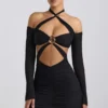 Vestito corto con spalline scese e ruches Kemina in nero Vestito corto con spalline scese e ruches Kemina in nero