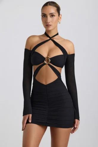 Vestito corto con spalline scese e ruches Kemina in nero Vestito corto con spalline scese e ruches Kemina in nero