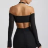 Vestito corto con spalline scese e ruches Kemina in nero Vestito corto con spalline scese e ruches Kemina in nero