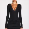 Vestito corto drappeggiato a maniche lunghe in modal a coste Elona, nero Vestito corto drappeggiato a maniche lunghe in modal a coste Elona, nero