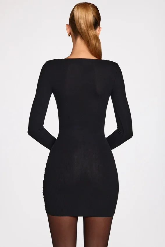 Vestito corto drappeggiato a maniche lunghe in modal a coste Elona, nero Vestito corto drappeggiato a maniche lunghe in modal a coste Elona, nero
