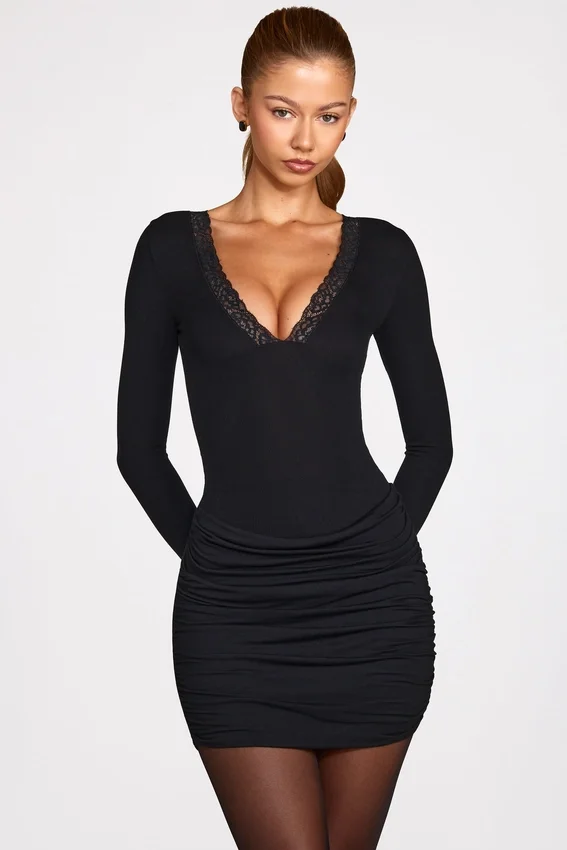 Vestito corto drappeggiato a maniche lunghe in modal a coste Elona, nero Vestito corto drappeggiato a maniche lunghe in modal a coste Elona, nero