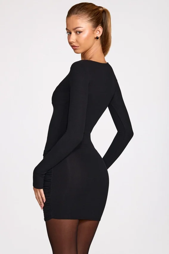 Vestito corto drappeggiato a maniche lunghe in modal a coste Elona, nero Vestito corto drappeggiato a maniche lunghe in modal a coste Elona, nero