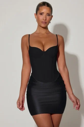 Vestito corto drappeggiato con corsetto Lovella in nero