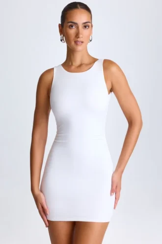Vestito corto drappeggiato con schiena scoperta Valetta in bianco