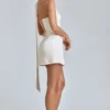 Vestito corto in raso drappeggiato con scollo all’americana Anastasia in avorio