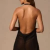 Vestito corto Iona con collo a cappuccio e schiena scoperta in nero Vestito corto Iona con collo a cappuccio e schiena scoperta in nero
