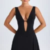 Vestito corto nero con scollo a V e cut-out Kalista Vestito corto nero con scollo a V e cut-out Kalista