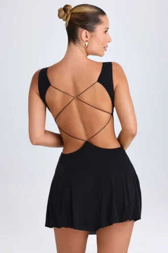 Vestito corto nero con scollo a V e cut-out Kalista