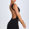 Vestito corto nero con scollo a V e cut-out Kalista Vestito corto nero con scollo a V e cut-out Kalista