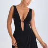 Vestito corto nero con scollo a V e cut-out Kalista Vestito corto nero con scollo a V e cut-out Kalista