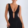 Vestito corto nero con scollo a V e cut-out Kalista Vestito corto nero con scollo a V e cut-out Kalista