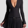 Vestito corto plissettato a maniche lunghe Fiorella in nero Vestito corto plissettato a maniche lunghe Fiorella in nero
