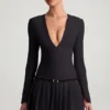 Vestito corto plissettato a maniche lunghe Fiorella in nero Vestito corto plissettato a maniche lunghe Fiorella in nero