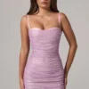 Vestito corto rosa con ruches e cut-out decorato Neréa Vestito corto rosa con ruches e cut-out decorato Neréa
