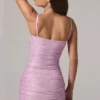 Vestito corto rosa con ruches e cut-out decorato Neréa Vestito corto rosa con ruches e cut-out decorato Neréa