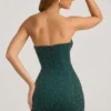 Vestito corto senza spalline con collo a cappuccio decorato Basel in verde smeraldo