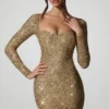 Vestito corto Sephina con scollo a cuore decorato in oro Vestito corto Sephina con scollo a cuore decorato in oro