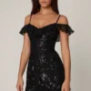 Vestito corto svasato con allacciatura decorata Jacira in nero Vestito corto svasato con allacciatura decorata Jacira in nero