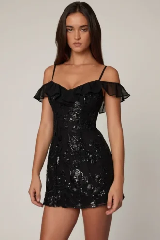 Vestito corto svasato con allacciatura decorata Jacira in nero Vestito corto svasato con allacciatura decorata Jacira in nero