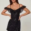 Vestito corto svasato con allacciatura decorata Jacira in nero Vestito corto svasato con allacciatura decorata Jacira in nero