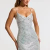 Vestito corto svasato con scollo a V e decorazioni Svana in argento