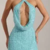 Vestito corto Sylune con collo a cappuccio decorato e schiena scoperta in blu acquamarina Vestito corto Sylune con collo a cappuccio decorato e schiena scoperta in blu acquamarina