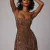 Vestito corto trasparente con decorazioni e scollo rotondo Durrani in color moka Vestito corto trasparente con decorazioni e scollo rotondo Durrani in color moka