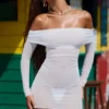 Vestito corto trasparente con spalle scoperte Nemba in bianco Vestito corto trasparente con spalle scoperte Nemba in bianco