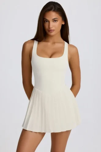 Vestito da tennis plissettato con schiena scoperta Soft Active in avorio Vestito da tennis plissettato con schiena scoperta Soft Active in avorio