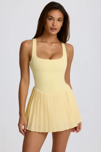 Vestito da tennis plissettato con schiena scoperta Soft Active in giallo limone Vestito da tennis plissettato con schiena scoperta Soft Active in giallo limone