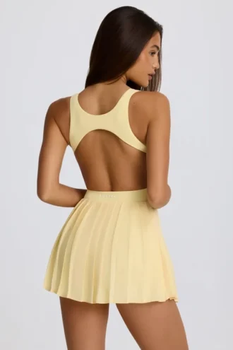 Vestito da tennis plissettato con schiena scoperta Soft Active in giallo limone Vestito da tennis plissettato con schiena scoperta Soft Active in giallo limone
