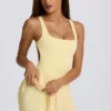 Vestito da tennis plissettato con schiena scoperta Soft Active in giallo limone