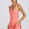 Vestito da tennis Soft Active con schiena scoperta in color corallo Vestito da tennis Soft Active con schiena scoperta in color corallo