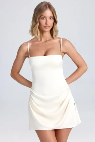 Vestito drappeggiato a trapezio Zoyna in avorio