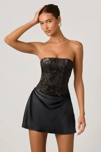 Vestito drappeggiato senza spalline con decorazioni Eden in nero