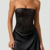 Vestito drappeggiato senza spalline con decorazioni Eden in nero Vestito drappeggiato senza spalline con decorazioni Eden in nero