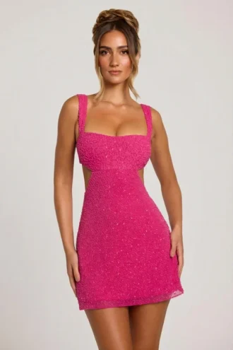 Vestito Emilion con cut-out decorato in fucsia