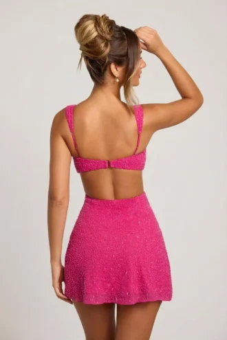 Vestito Emilion con cut-out decorato in fucsia