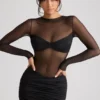 Vestito Essie con maniche lunghe e inserti trasparenti in nero Vestito Essie con maniche lunghe e inserti trasparenti in nero
