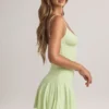 Vestito Kelbie in modal con ruches e linea ad A in verde salvia Vestito Kelbie in modal con ruches e linea ad A in verde salvia