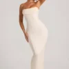 Vestito lungo a fascia con collo a cappuccio e decorazioni Palermo in bianco Vestito lungo a fascia con collo a cappuccio e decorazioni Palermo in bianco