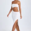 Vestito lungo a fascia con cut-out Kaikoa in bianco Vestito lungo a fascia con cut-out Kaikoa in bianco