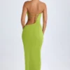 Vestito lungo a fascia con cut-out Kaikoa in verde pera Vestito lungo a fascia con cut-out Kaikoa in verde pera