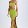 Vestito lungo a fascia con cut-out Kaikoa in verde pera Vestito lungo a fascia con cut-out Kaikoa in verde pera
