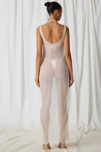 Vestito lungo con cut-out e dettagli in perla Pacifica in bianco perla