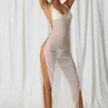 Vestito lungo con cut-out e dettagli in perla Pacifica in bianco perla Vestito lungo con cut-out e dettagli in perla Pacifica in bianco perla